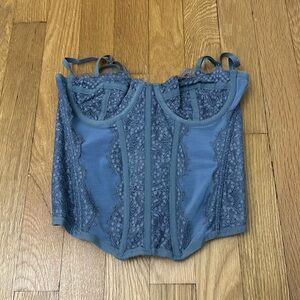 out and under blue corset top, size small.
